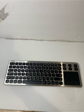 Arteck Wireless Slim Keyboard with Touchpad - Silver and Black